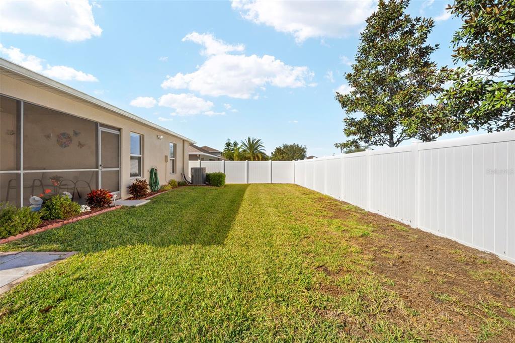 10114 Ives Loop Hudson, FL 34667 - Photo 47 of 49 a view of outdoor space and yard
