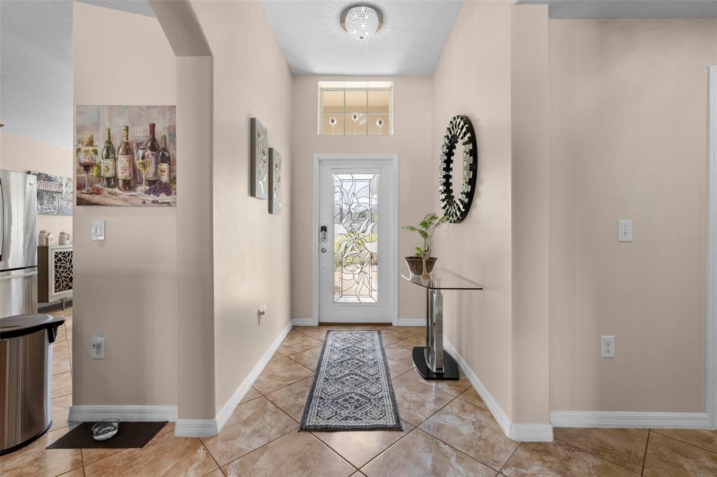 10114 Ives Loop Hudson, FL 34667 - Photo 7 of 49 a view of an entryway with a rug