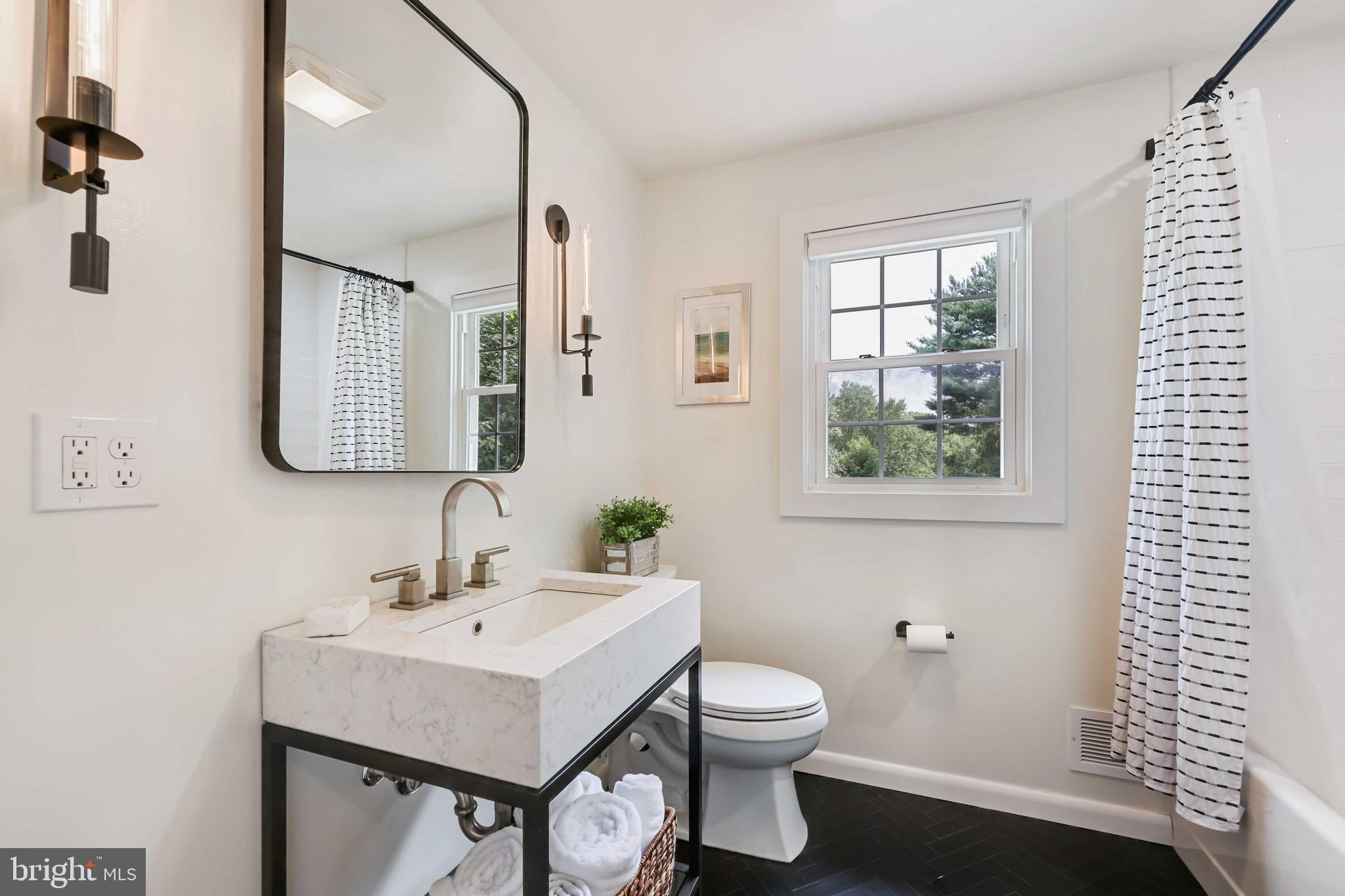 455 Schley Road Annapolis, MD 21401 - Photo 27 of 67 Stylish black and white upper level full bathroom