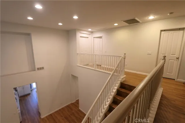 a view of entryway with wooden floor