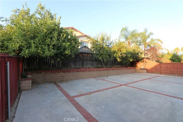 a view of backyard with green space