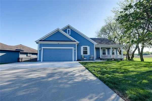 $388,500 | 2010 Prairie Grass Drive, Raymore, MO 64083