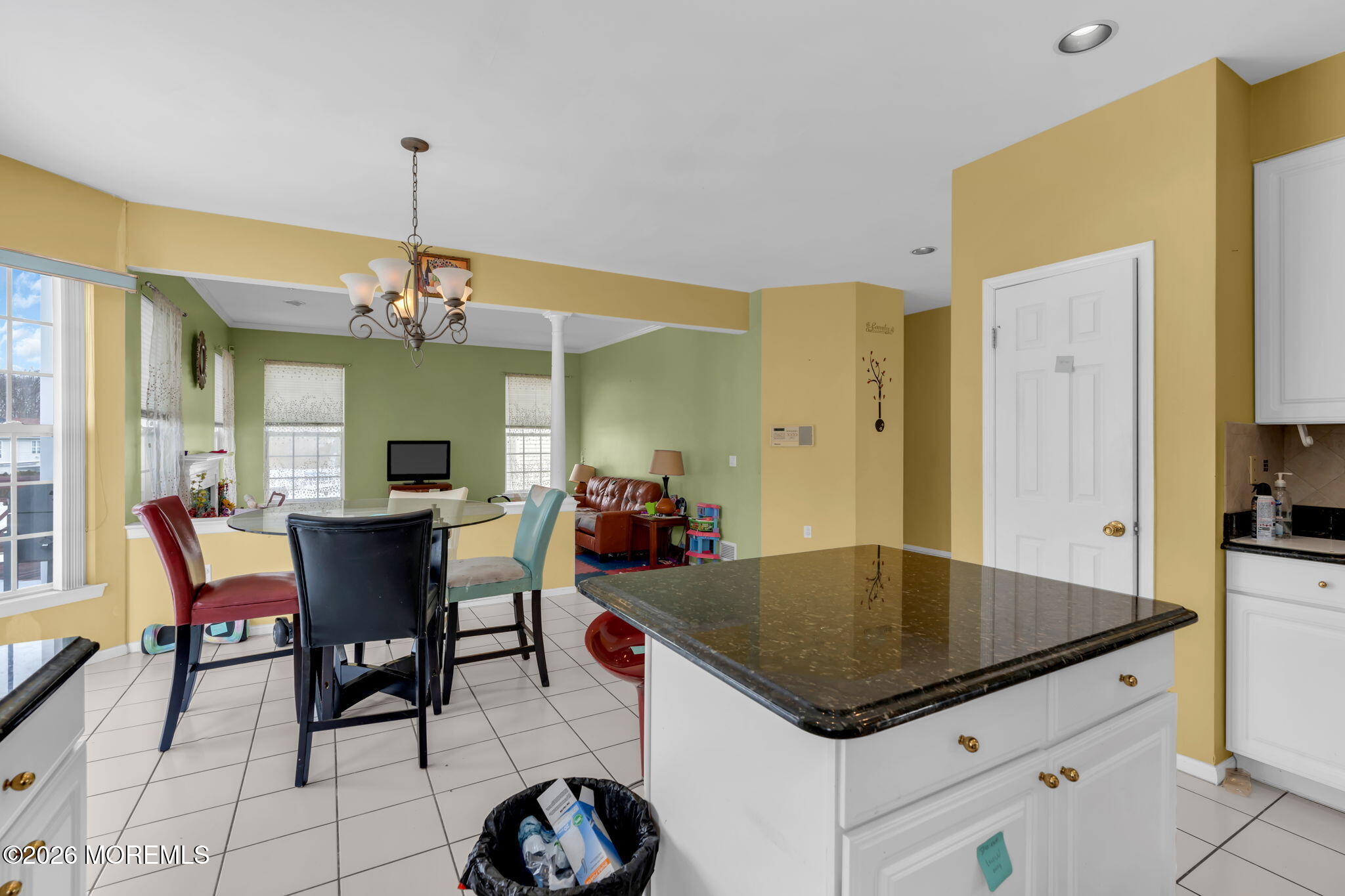18 Lysbeth Lane Matawan, NJ 07747 - Photo 13 of 36 a view of a dining room kitchen furniture and a chandelier