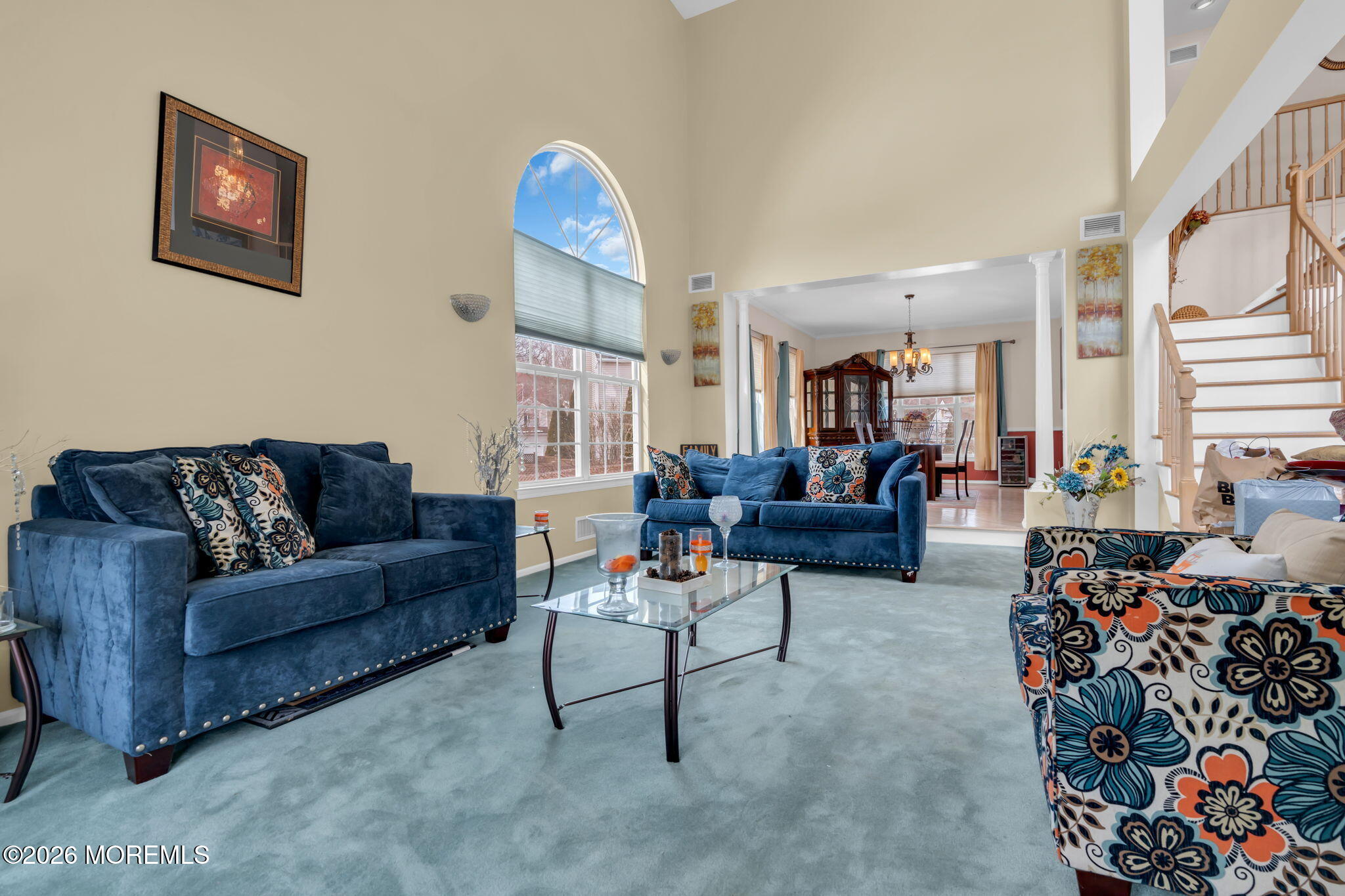 18 Lysbeth Lane Matawan, NJ 07747 - Photo 18 of 36 a living room with furniture and a painting on the wall