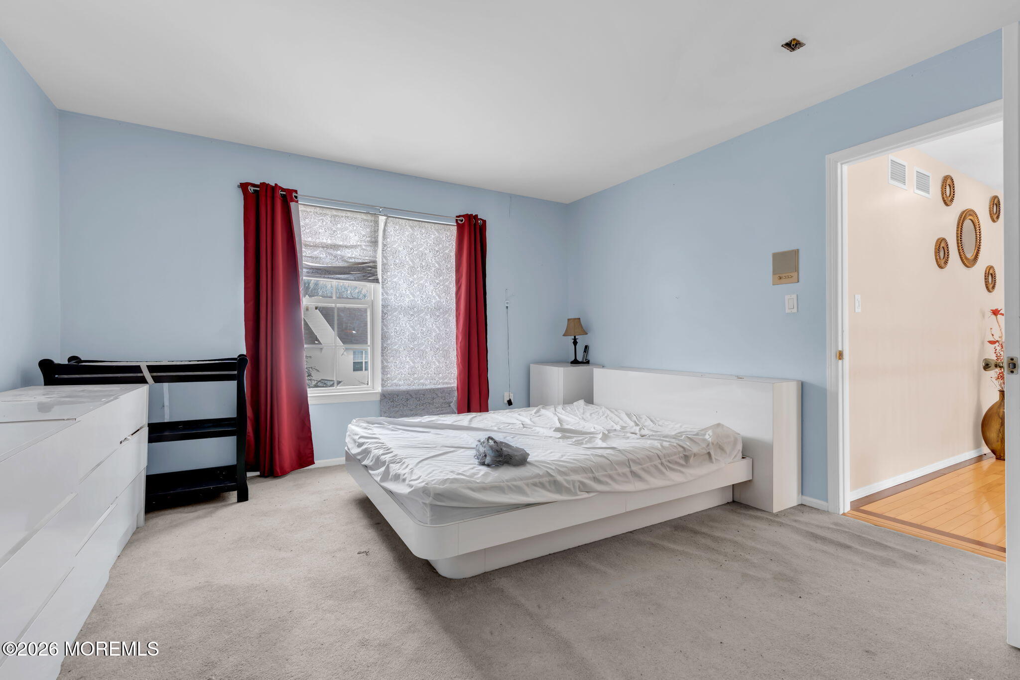 18 Lysbeth Lane Matawan, NJ 07747 - Photo 20 of 36 a bedroom with a bed and a dresser