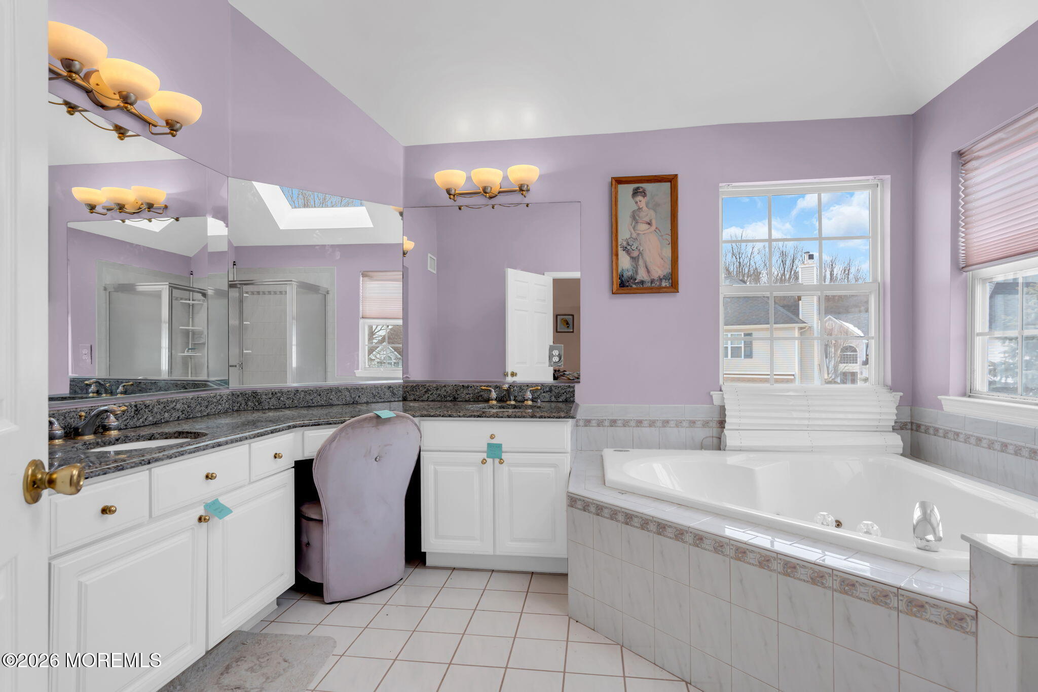 18 Lysbeth Lane Matawan, NJ 07747 - Photo 24 of 36 a spacious en suite bathroom with a granite countertop tub and a sink