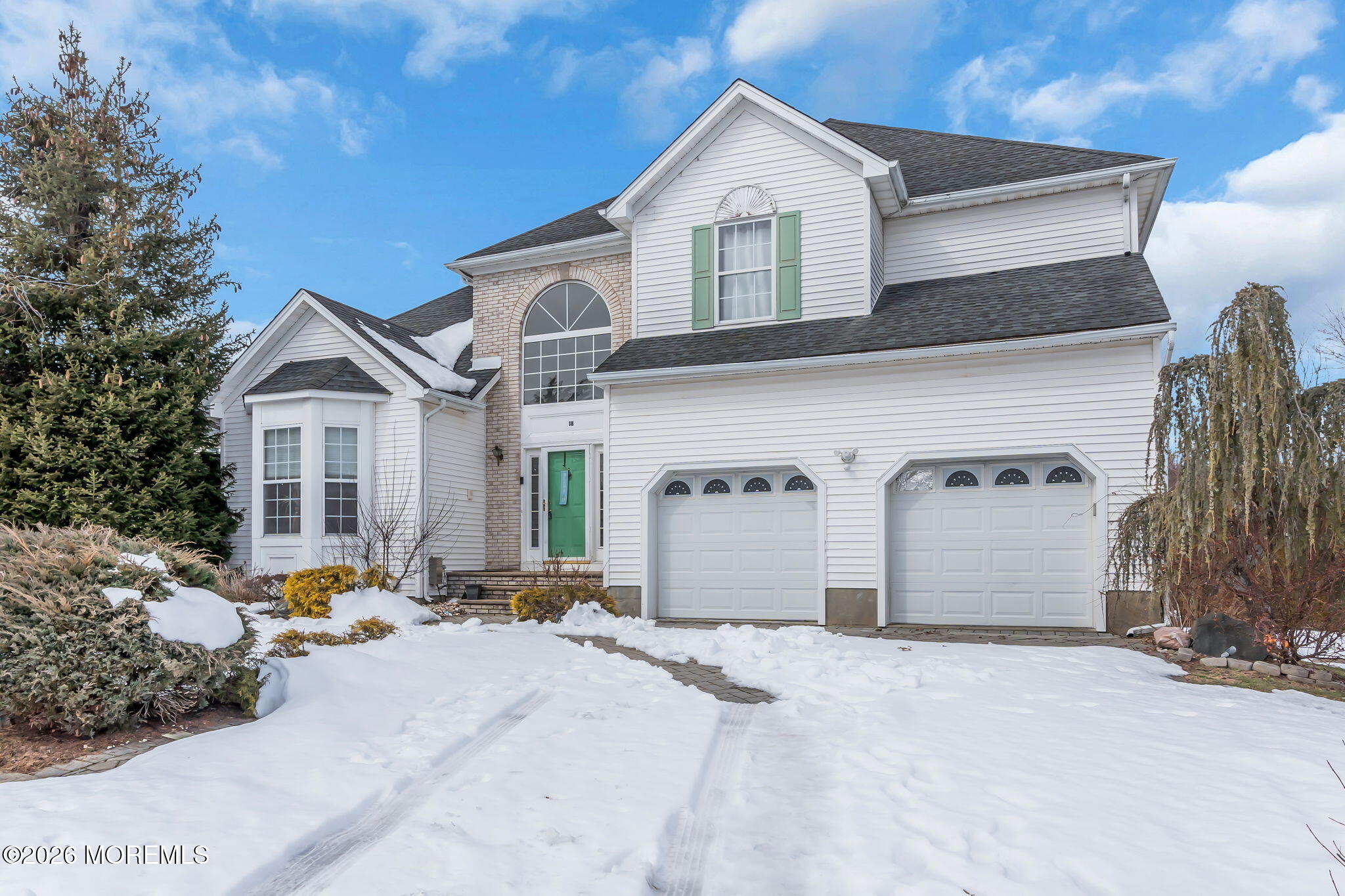 18 Lysbeth Lane Matawan, NJ 07747 - Photo 3 of 36 a front view of a house with parking