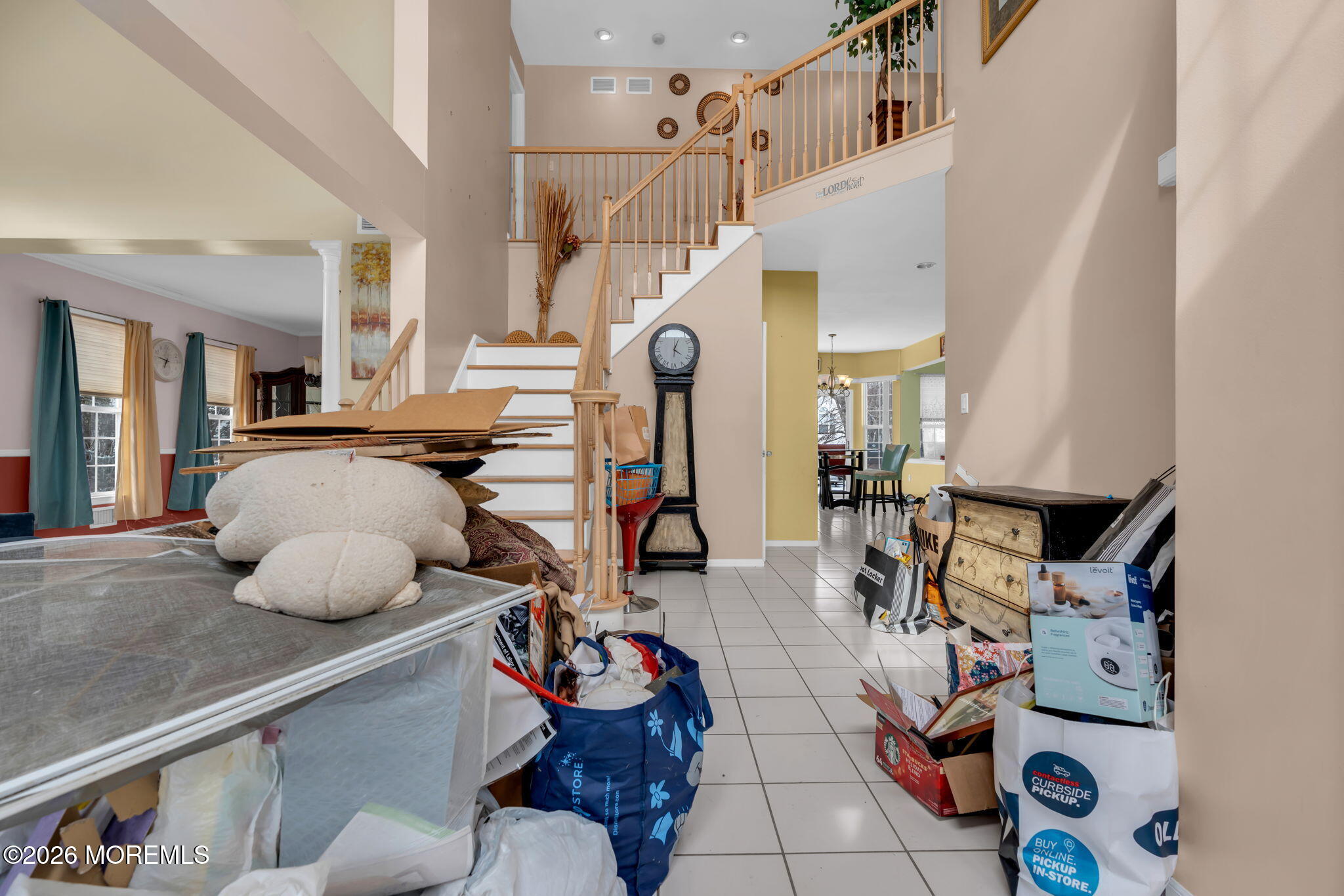 18 Lysbeth Lane Matawan, NJ 07747 - Photo 4 of 36 a room with lots of white furniture and wooden floor