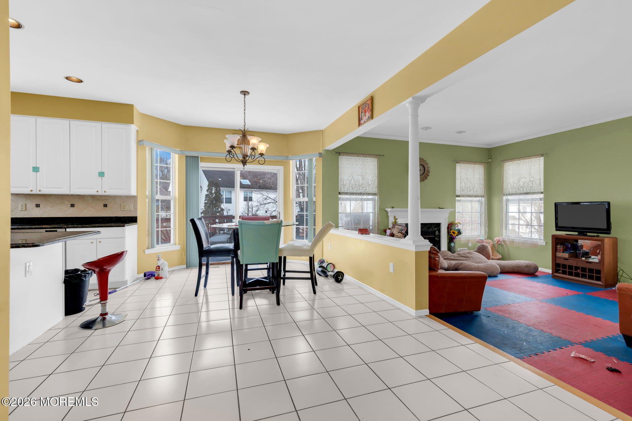 18 Lysbeth Lane Matawan, NJ 07747 - Photo 7 of 36 a living room with fireplace furniture and a flat screen tv