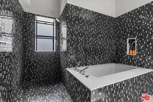 a view of balcony with wooden floor