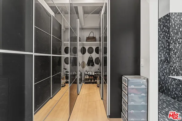 a view of a hallway with windows