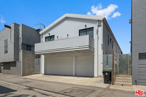 a view of street with parked cars