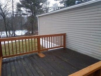 46 Madden Road, Unit 38 West Brookfield, MA 01585 - Photo 11 of 37 a view of deck and wooden floor