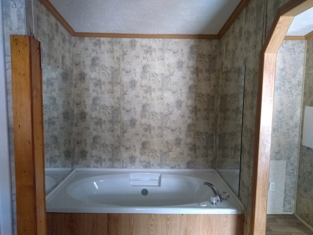 46 Madden Road, Unit 38 West Brookfield, MA 01585 - Photo 29 of 37 a bathroom with a bath tub and shower