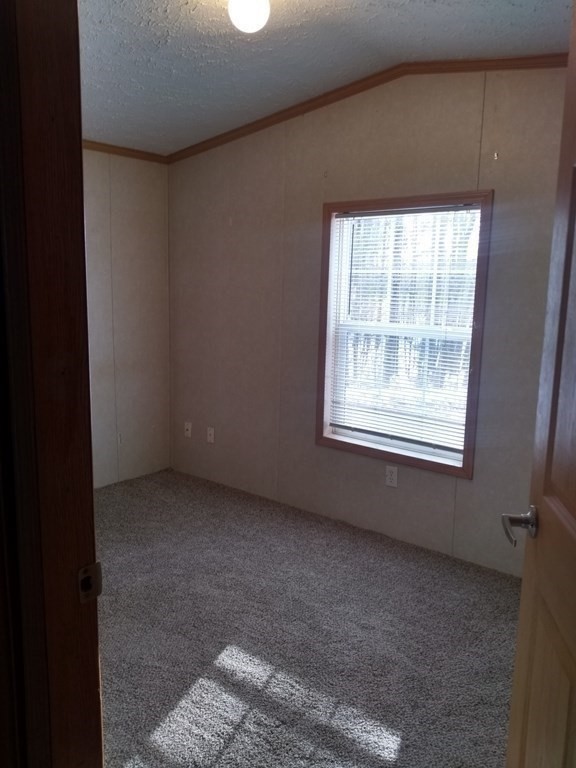 46 Madden Road, Unit 38 West Brookfield, MA 01585 - Photo 30 of 37 a view of an empty room with a window