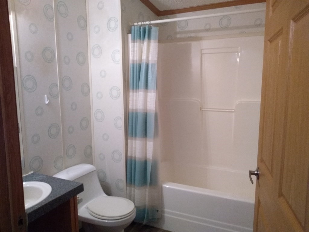 46 Madden Road, Unit 38 West Brookfield, MA 01585 - Photo 32 of 37 a bathroom with a shower and a toilet