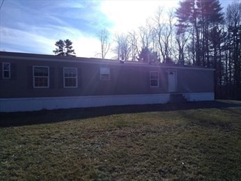 46 Madden Road, Unit 38 West Brookfield, MA 01585 - Photo 7 of 37 a view of a yard