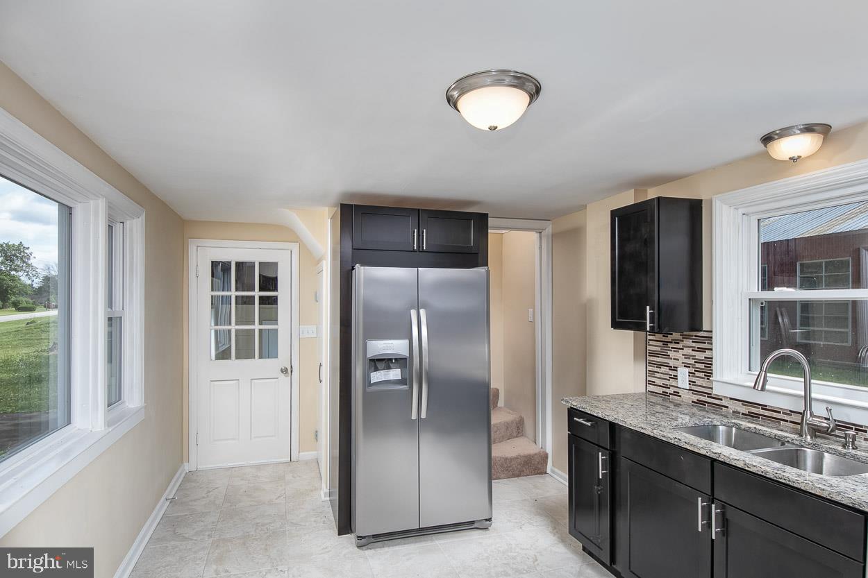4640 Paradise Road Dover, PA 17315 - Photo 15 of 47 Kitchen with door to garage