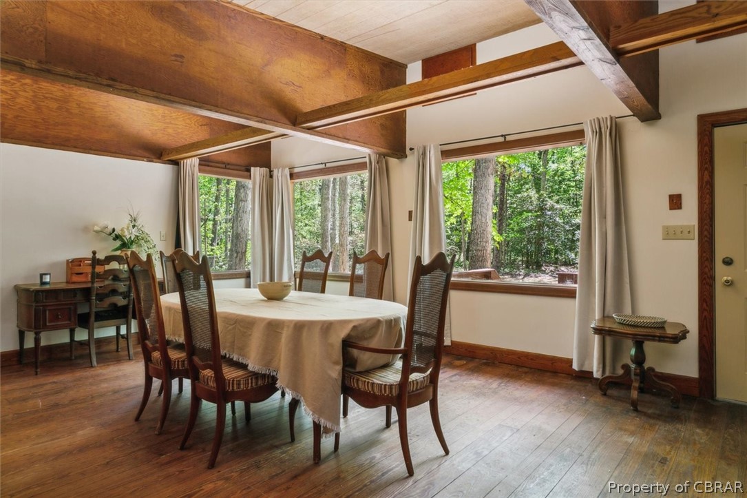 4544 Piney Swamp Road Hayes, VA 23072 - Photo 12 of 48 Dining area featuring a wealth of natural light and dark wood-type flooring