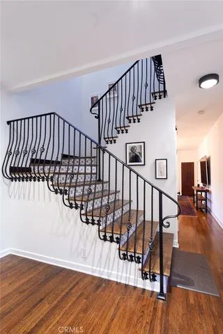 a view of entryway with wooden floor