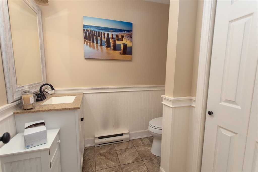 11 Village Green Road, Unit B Bourne, MA 02562 - Photo 15 of 23 a bathroom with a sink and a toilet