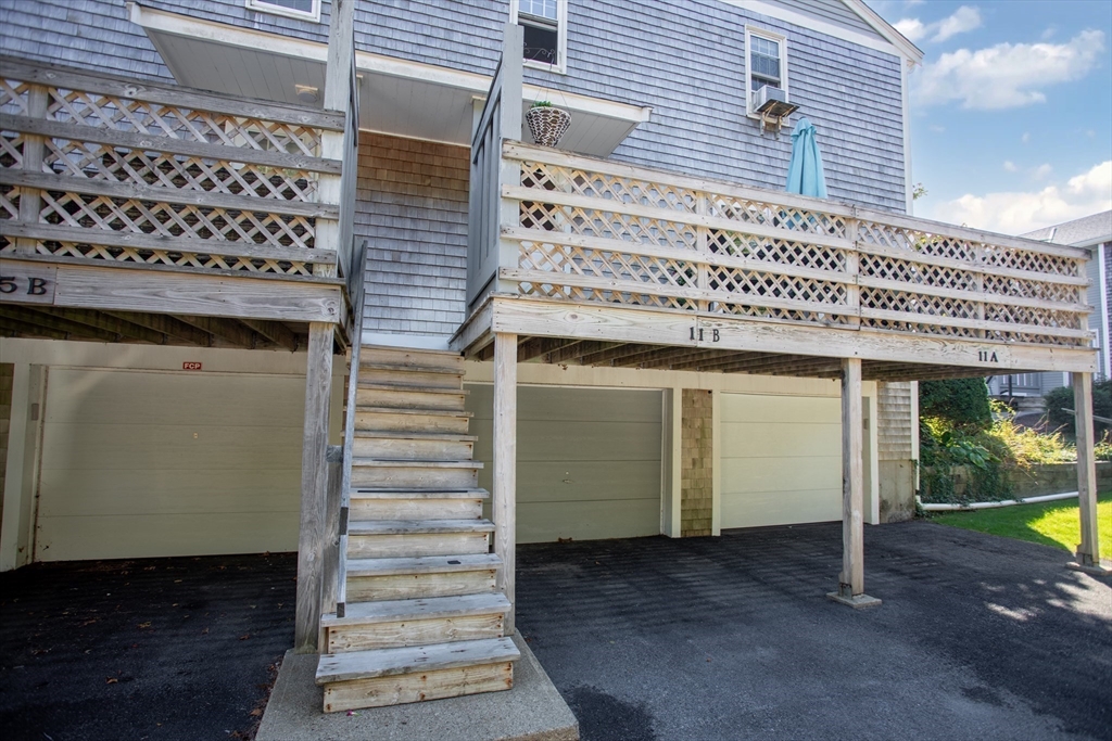 11 Village Green Road, Unit B Bourne, MA 02562 - Photo 19 of 23 a view of a building with entryway