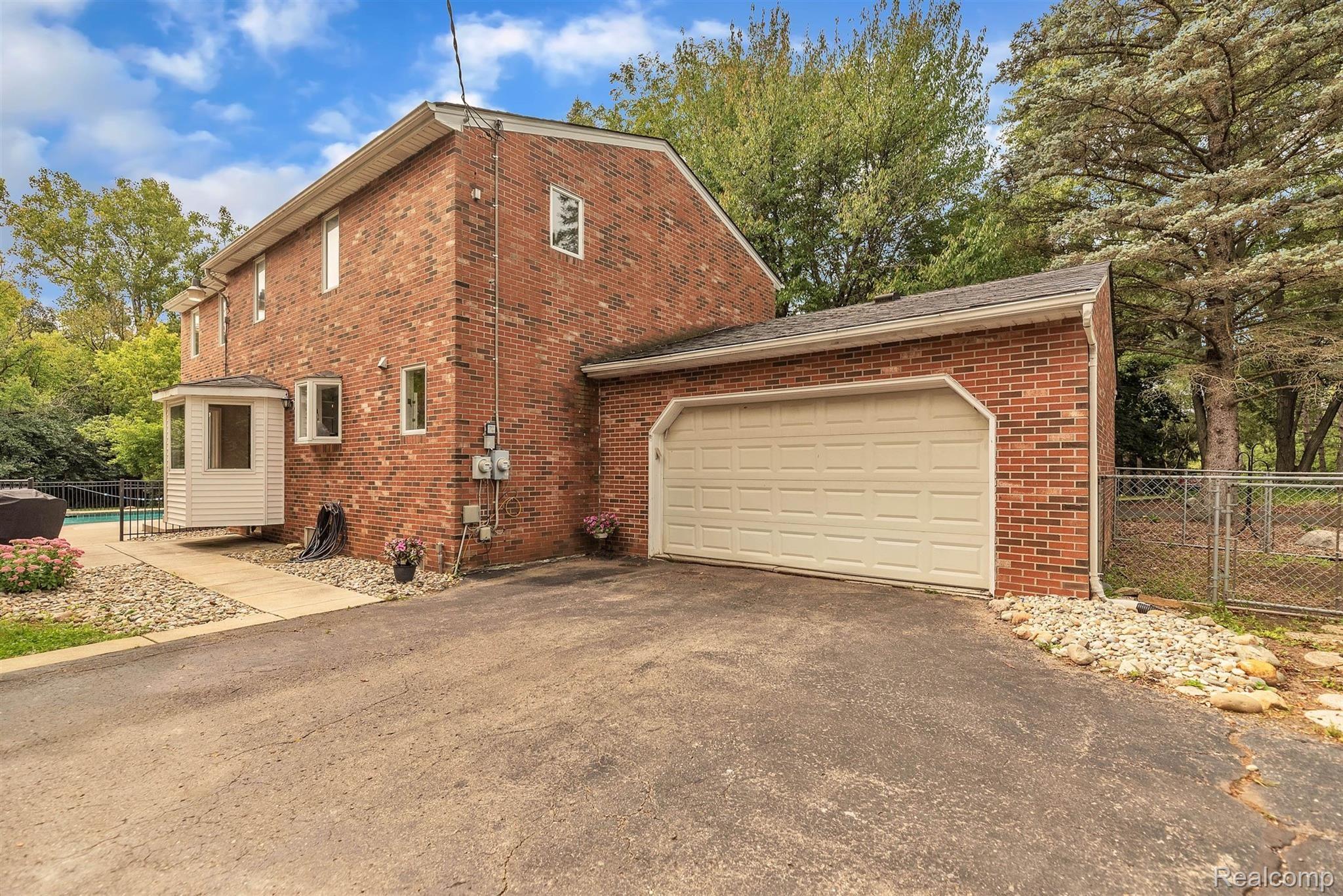 8830 Napier Road Northville, MI 48168 - Photo 40 of 47 47-8830 Napier Rd-WindowStill-Real-.jpg