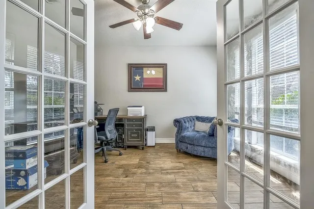 a picture of a bathroom with a shower