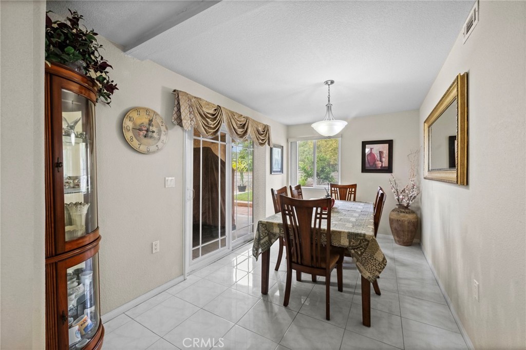 605 Bronco Way Walnut, CA 91789 - Photo 20 of 69 a view of a dining room with furniture and window