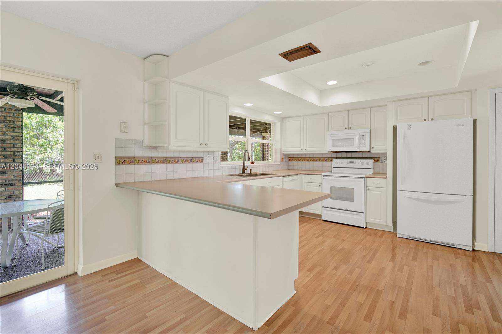 10435 Southwest 96th Street Miami, FL 33176 - Photo 15 of 44 Different view to the kitchen