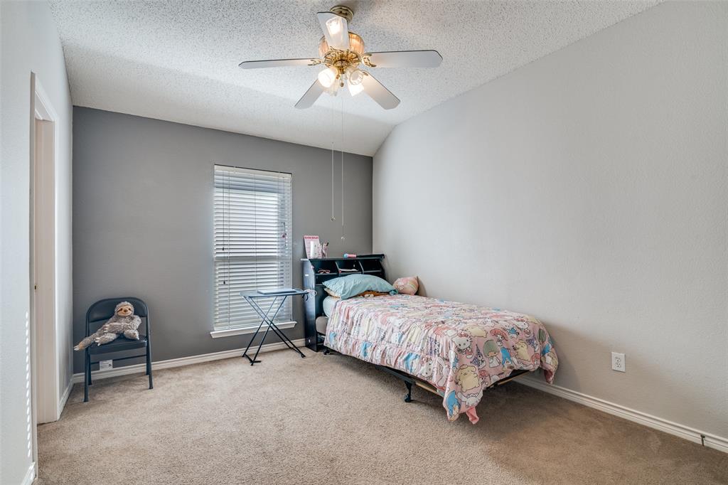 3214 Chalkstone Drive Rowlett, TX 75088 - Photo 24 of 36 View of secondary bedroom. Full bath included and separate wing of house.