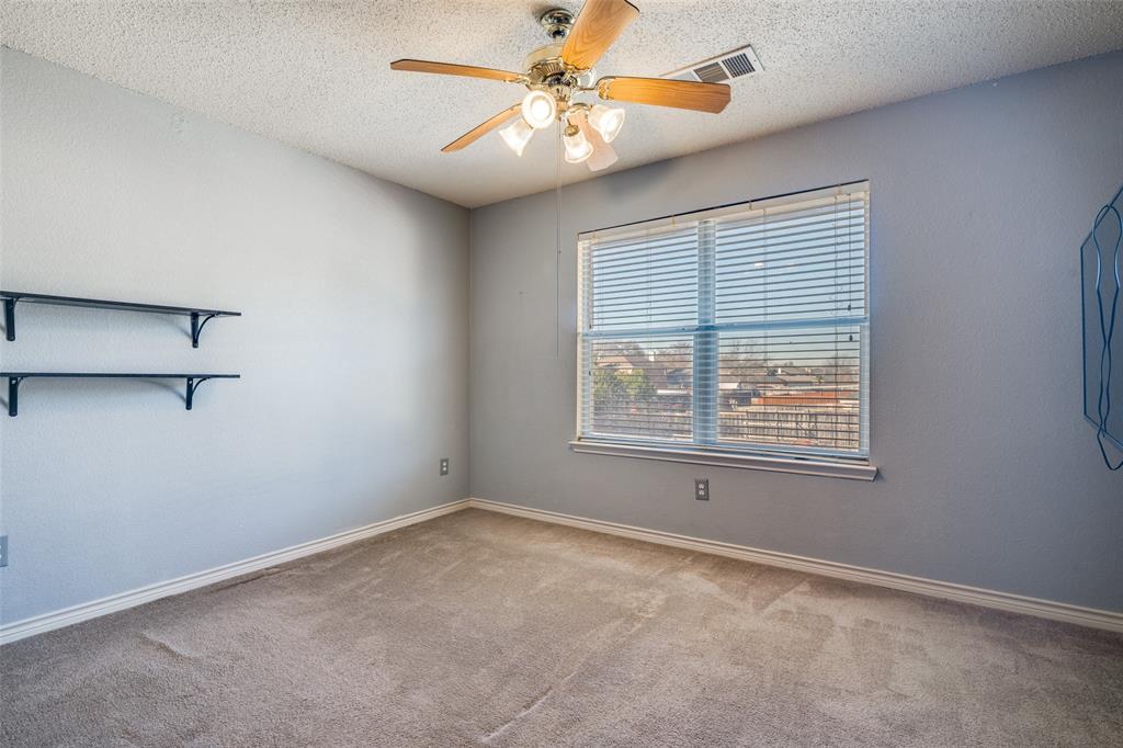 3214 Chalkstone Drive Rowlett, TX 75088 - Photo 29 of 36 Another view of upstairs bedroom.