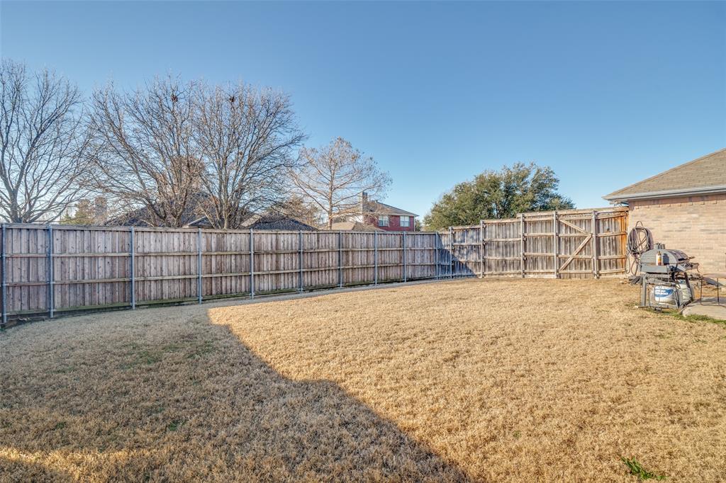 3214 Chalkstone Drive Rowlett, TX 75088 - Photo 34 of 36 Entertain in this sizable fenced backyard.