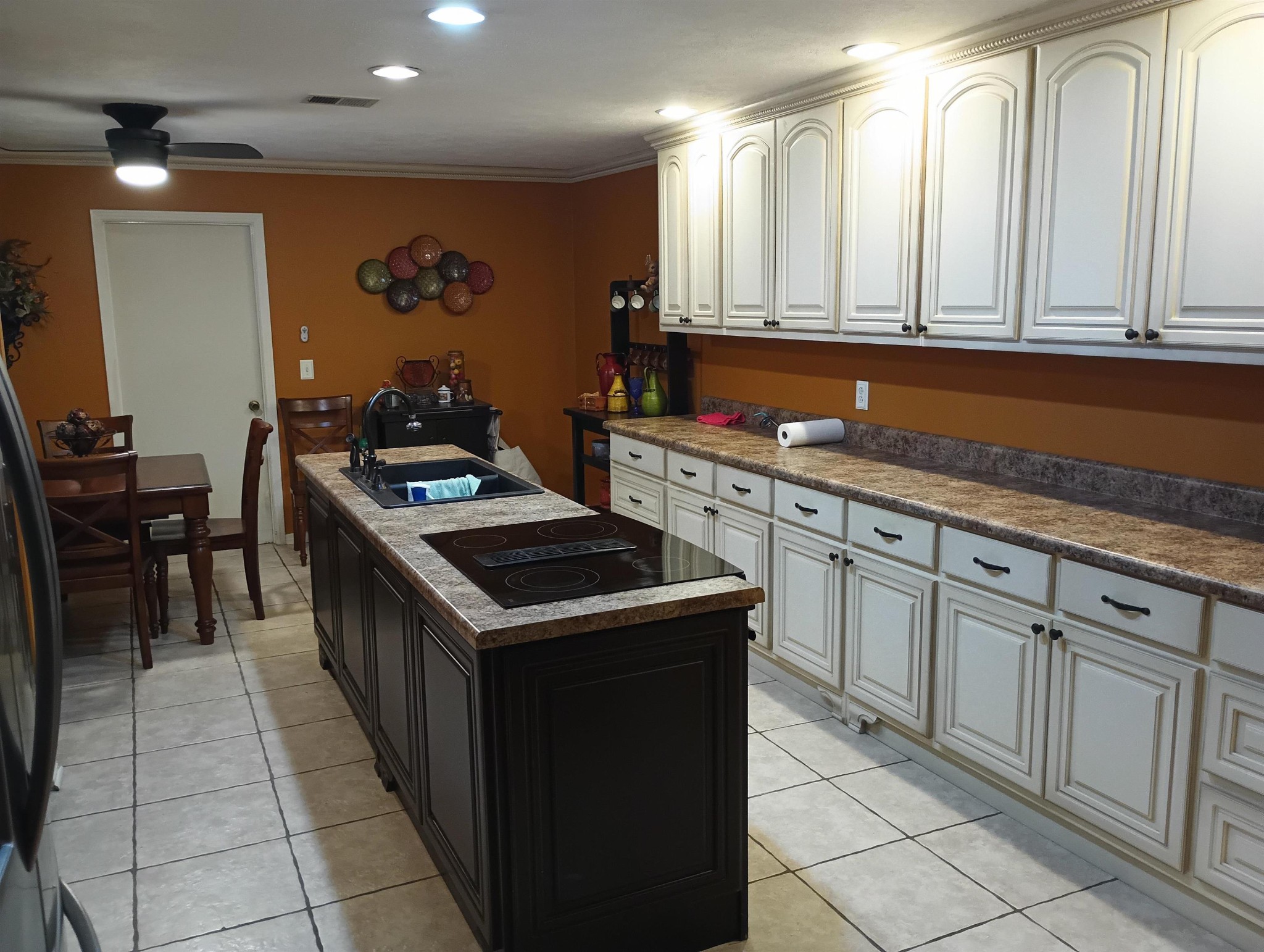 540 Willoughby Loop Savannah, TN 38372 - Photo 14 of 25 a kitchen with granite countertop a sink and a stove
