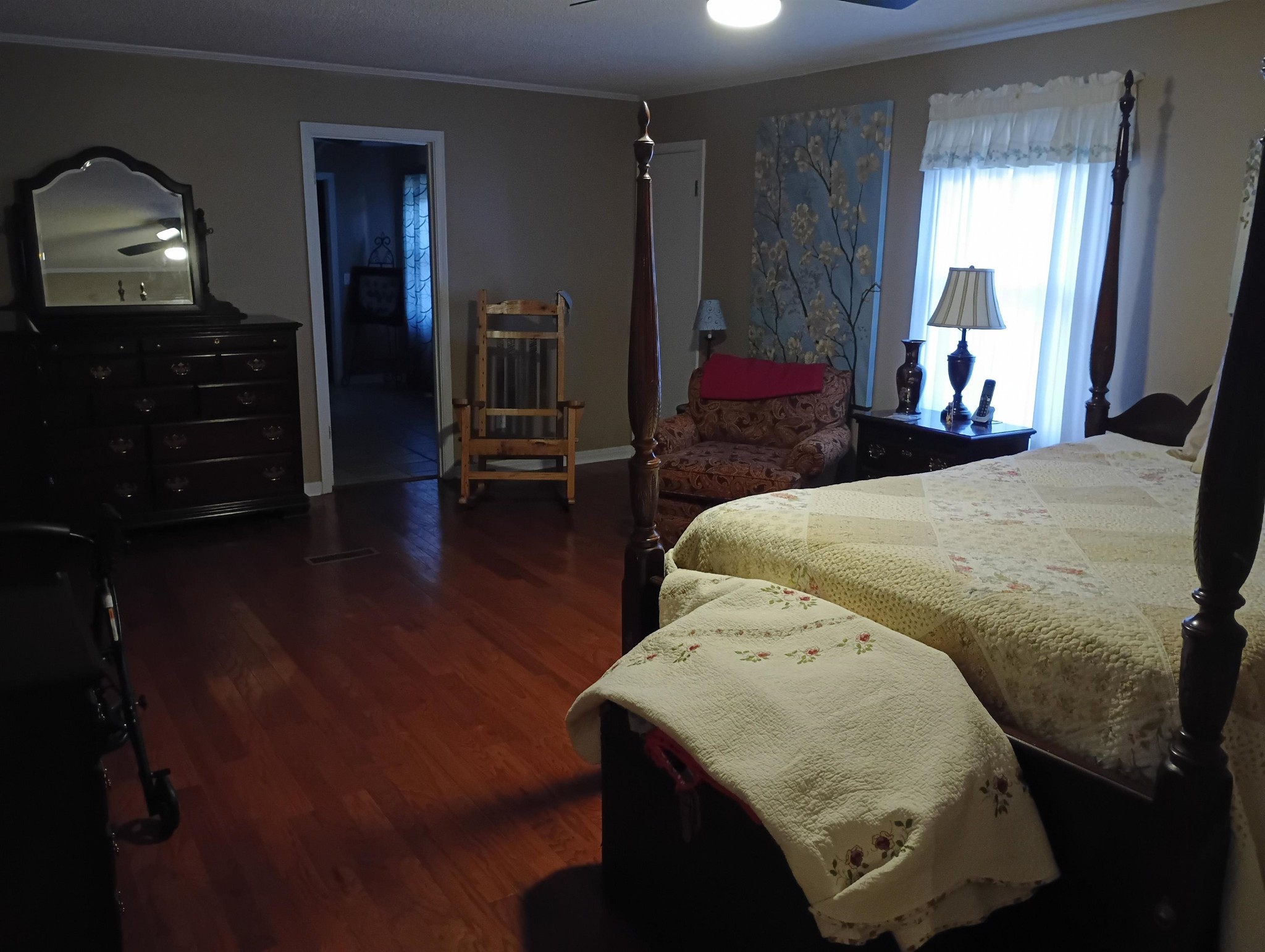 540 Willoughby Loop Savannah, TN 38372 - Photo 18 of 25 a bedroom with a bed and dresser with mirror
