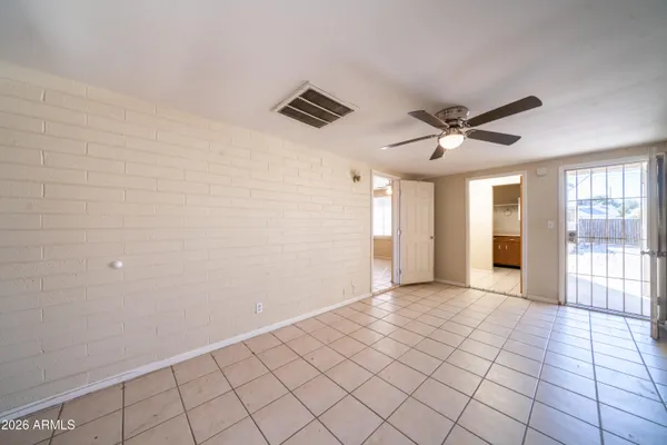 a view of an empty room and window