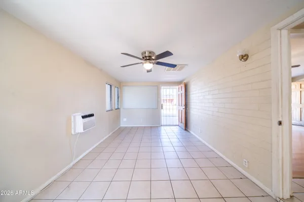 a view of an empty room and window