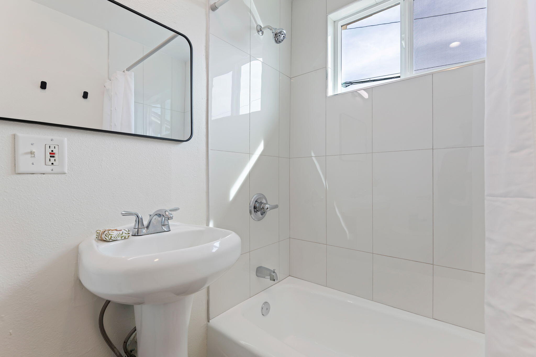 4200 South A Street Oxnard, CA 93033 - Photo 14 of 23 a bathroom with a sink a toilet and mirror