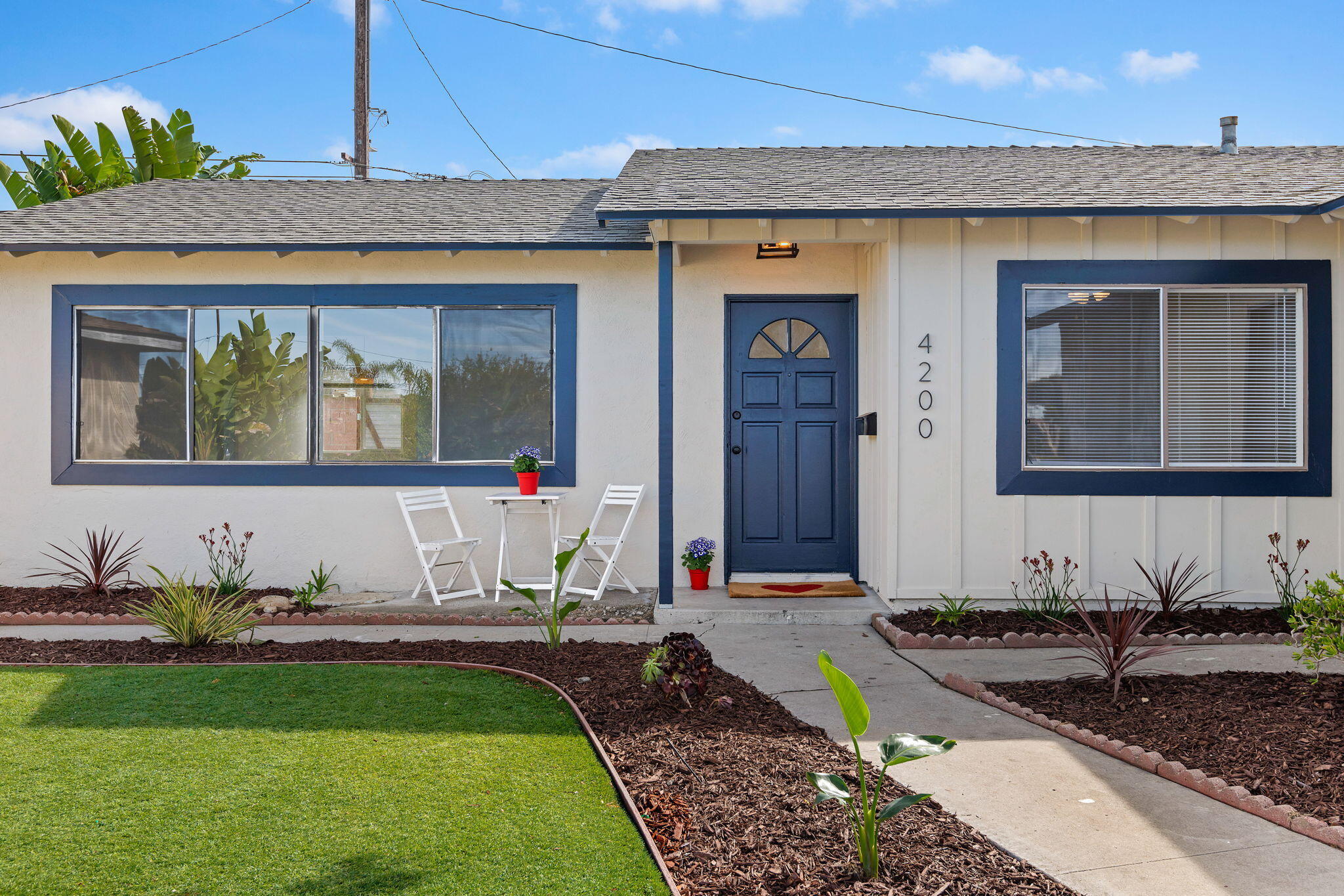 4200 South A Street Oxnard, CA 93033 - Photo 2 of 23 a front view of a house with garden