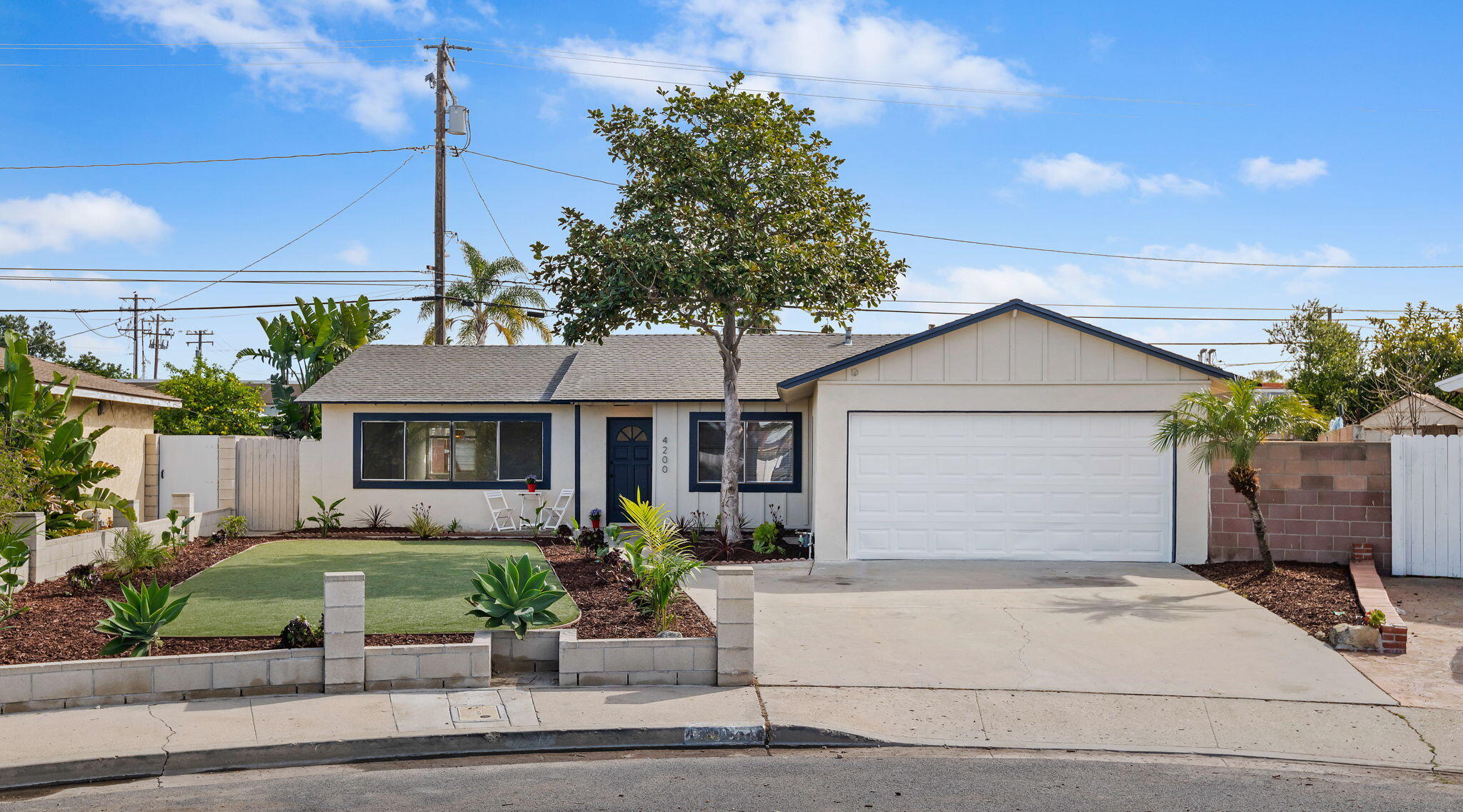 4200 South A Street Oxnard, CA 93033 - Photo 23 of 23 a front view of a house with a garden