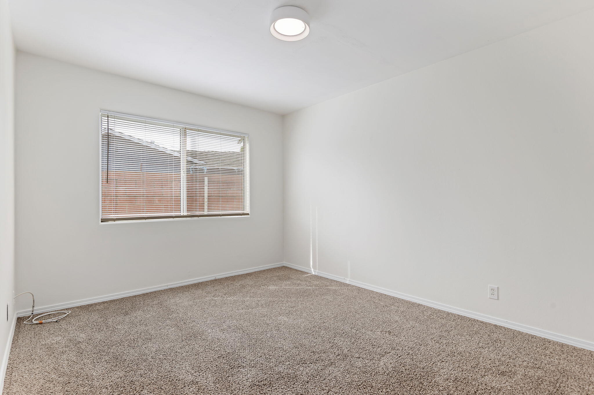 4200 South A Street Oxnard, CA 93033 - Photo 10 of 23 an empty room with windows and closet