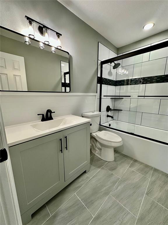 460 Base Avenue East, Unit 129 Venice, FL 34285 - Photo 15 of 33 a bathroom with a sink a toilet and shower