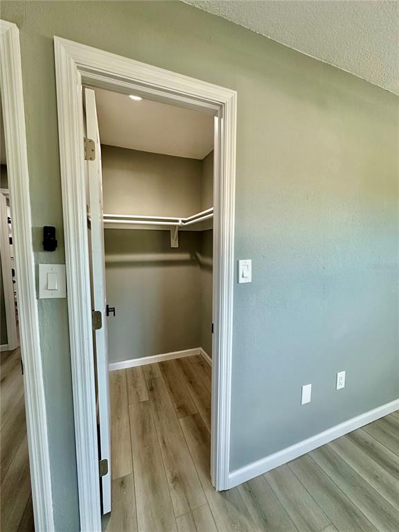 460 Base Avenue East, Unit 129 Venice, FL 34285 - Photo 20 of 33 a bathroom with a glass shower door