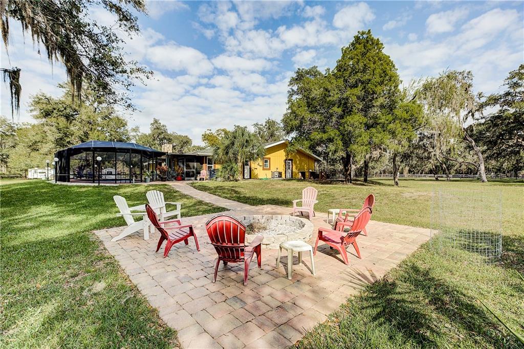 4873 Old Ranch Road Sarasota, FL 34241 - Photo 26 of 49 Big fire pit on the east side of the home.