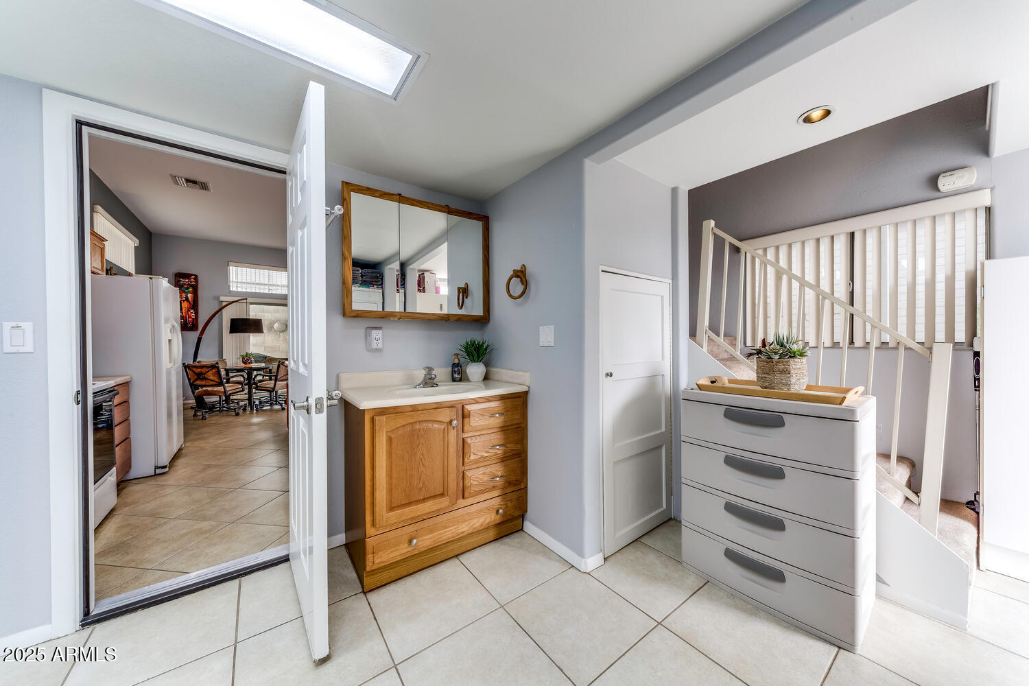 17200 West Bell Road, Unit 1770 Surprise, AZ 85374 - Photo 19 of 36 a kitchen with stainless steel appliances cabinets and a window