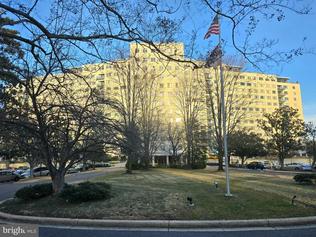 a view of a trees in front of a building