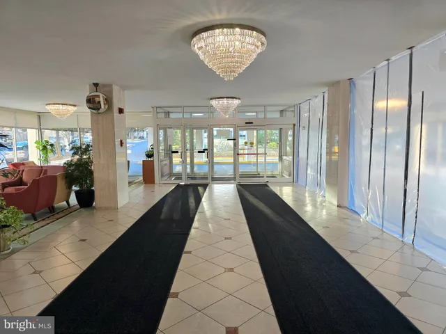 a view of a large room with wooden floor