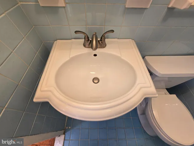 a bathroom with a shower and a tub