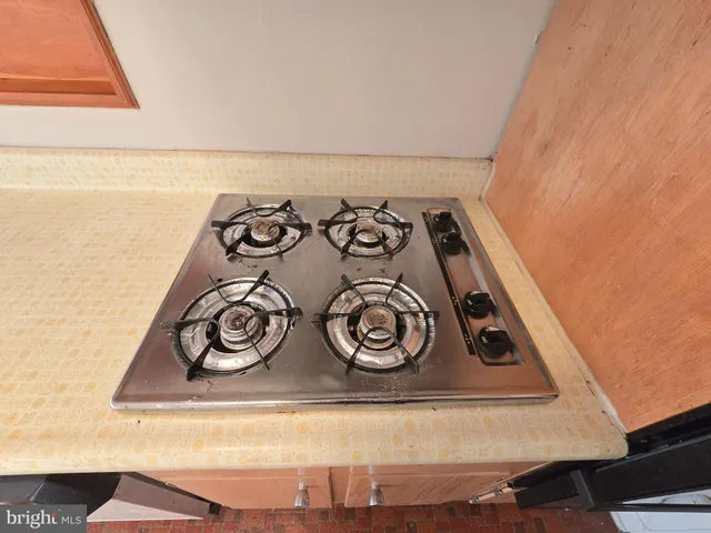 a view of a refrigerator in kitchen