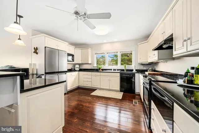 a large kitchen with cabinets